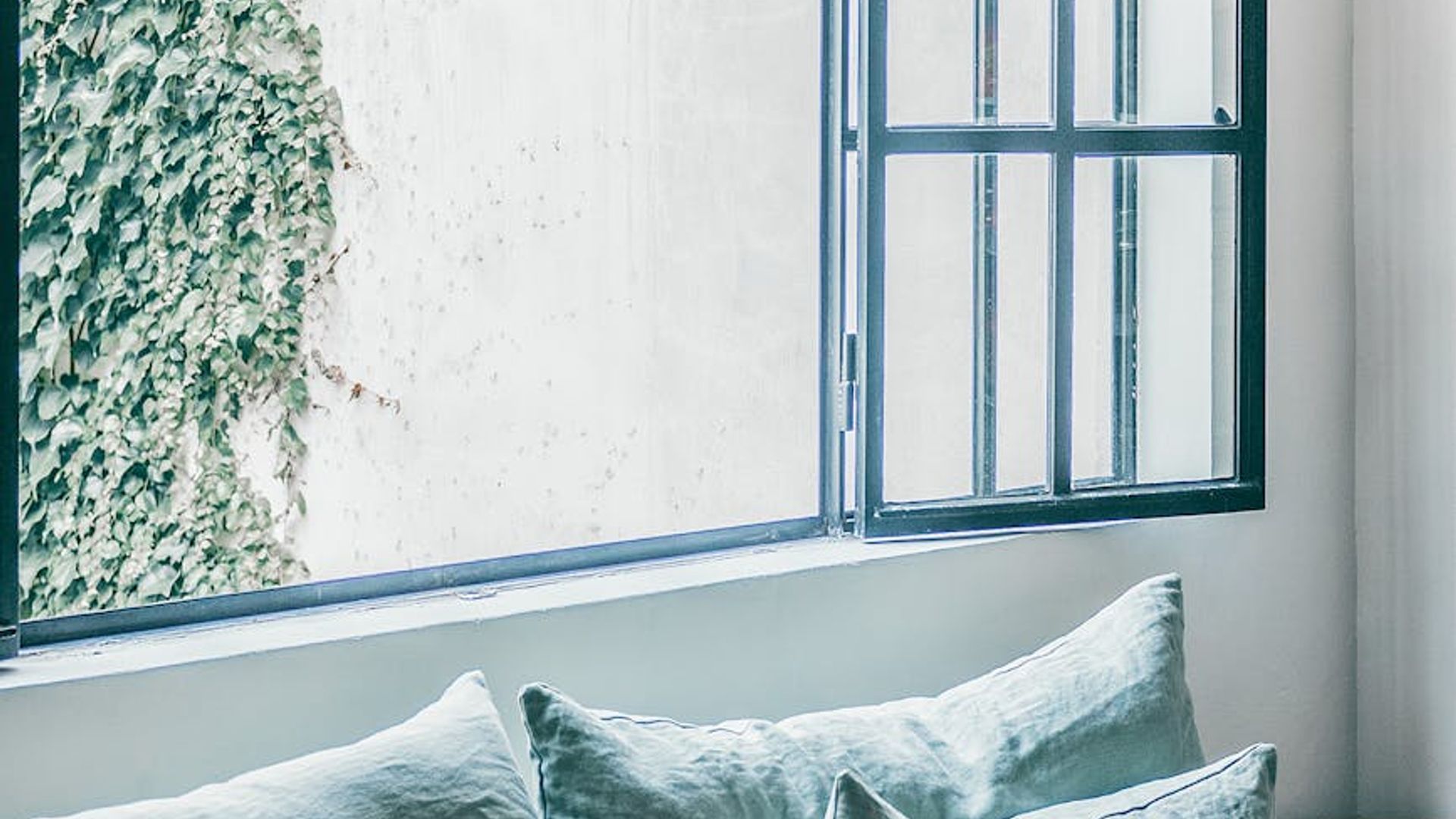 A serene and spacious empty room with soft lighting, ready for practice.